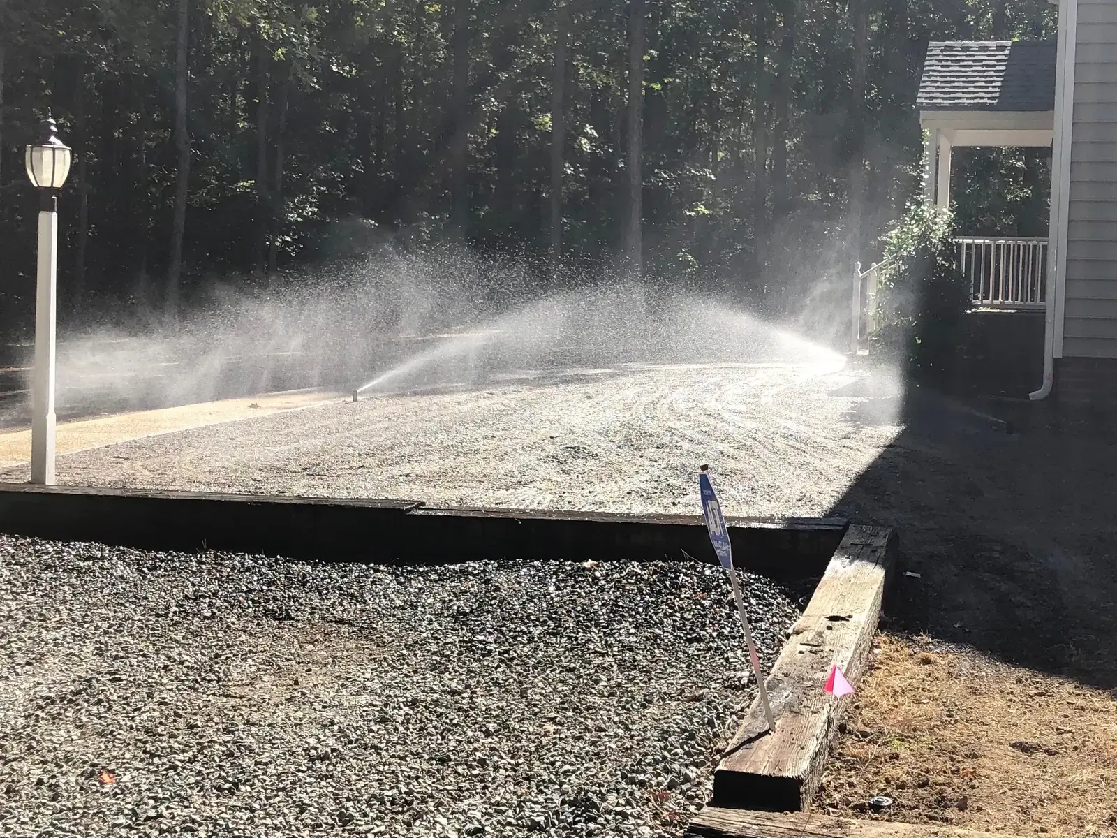 Irrigation sprinklers watering the Hames property