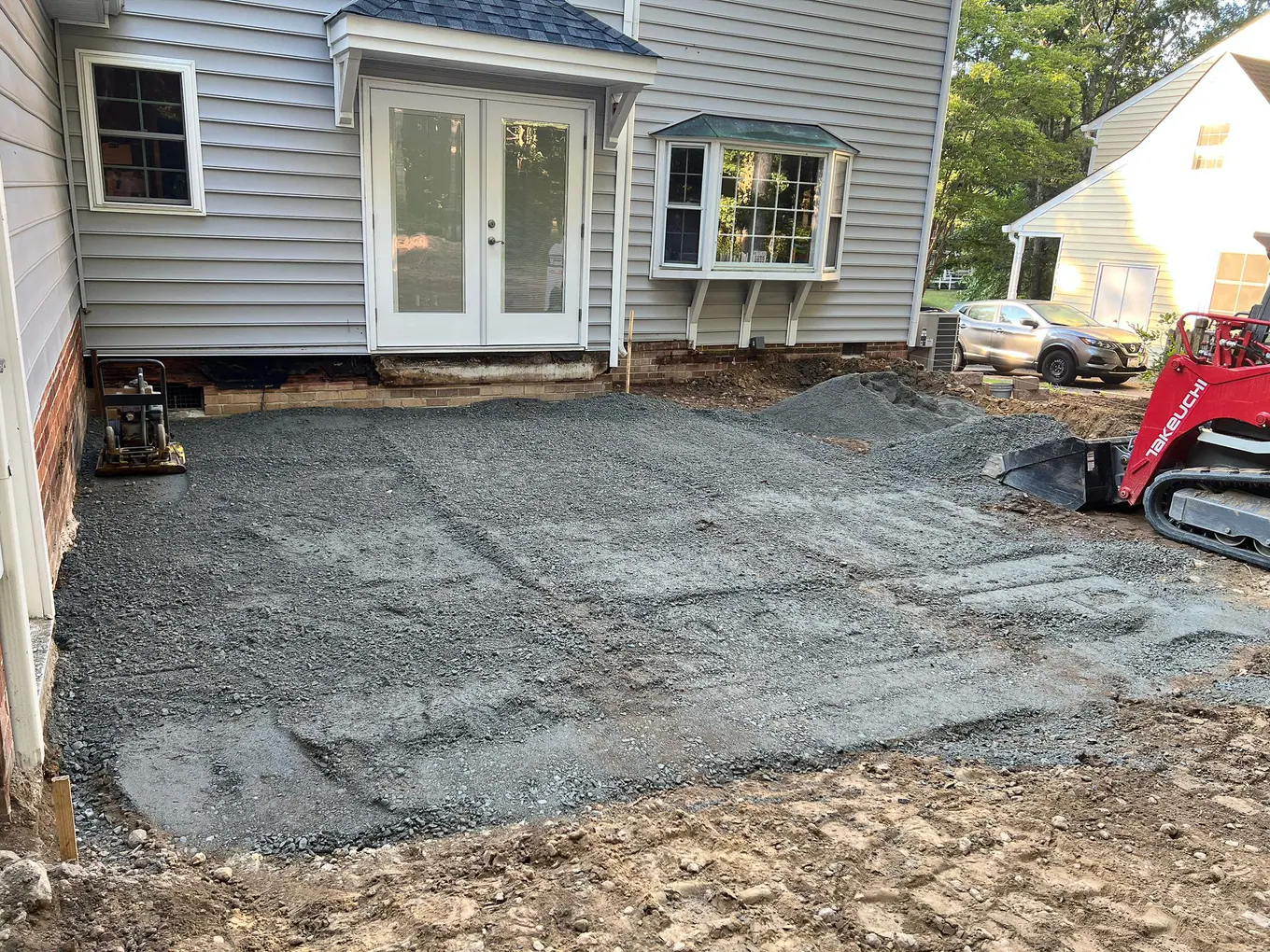 Gravel base prepared for the new paver patio