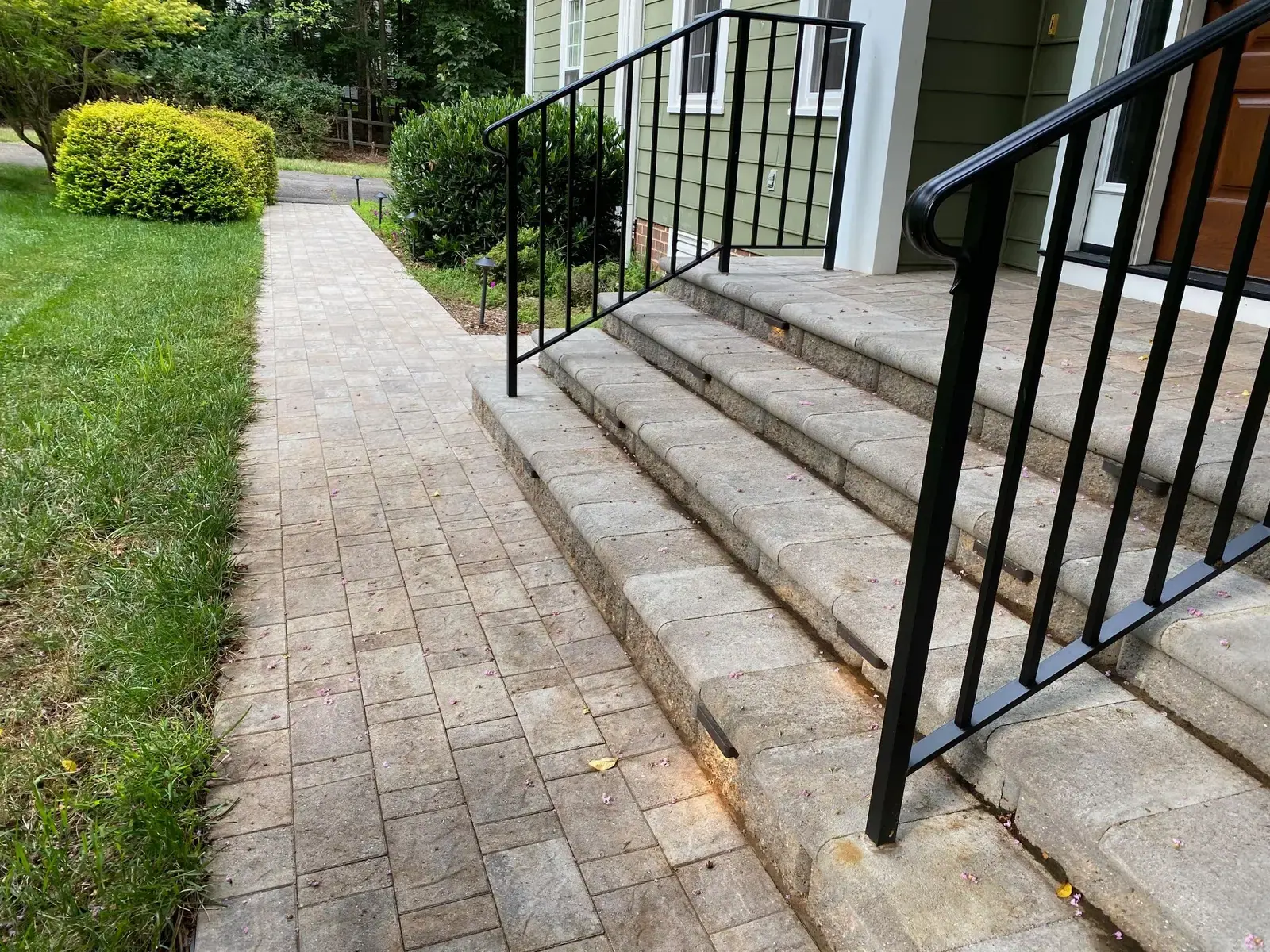 Paver walkway alongside the entrance steps