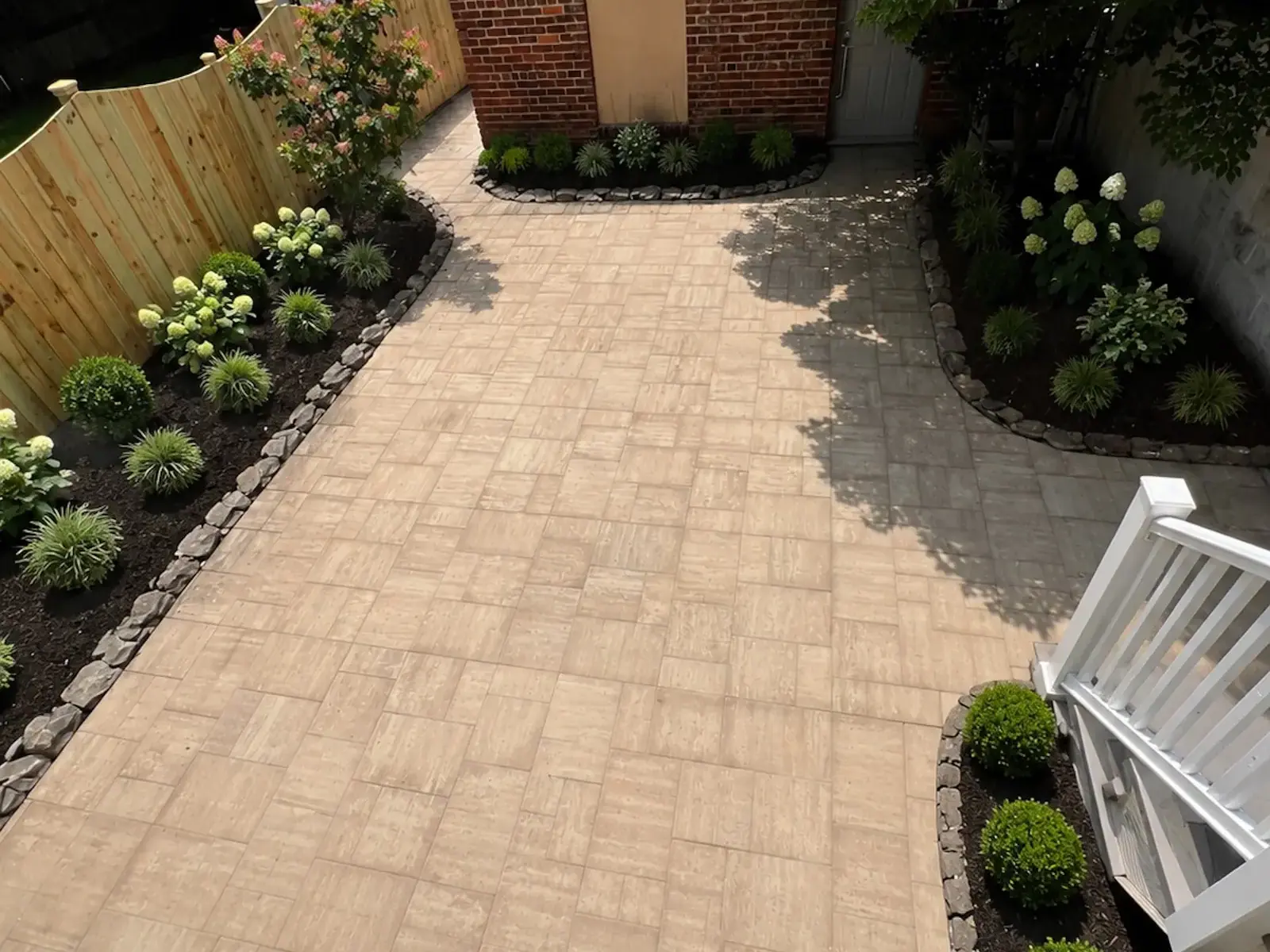 Inner Patio: Completed paver patio with planted borders
