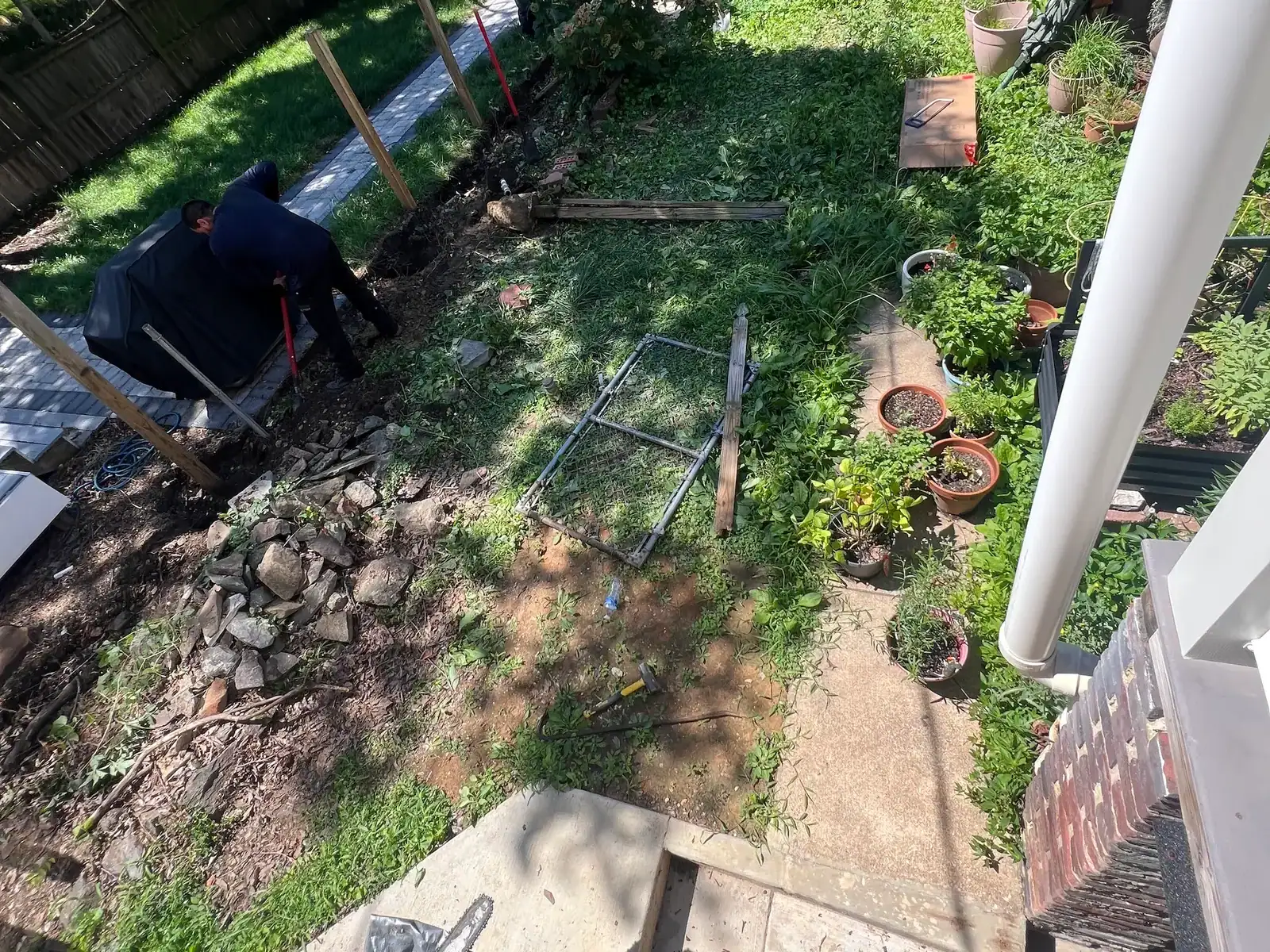 Backyard beside the brick home before the transformation