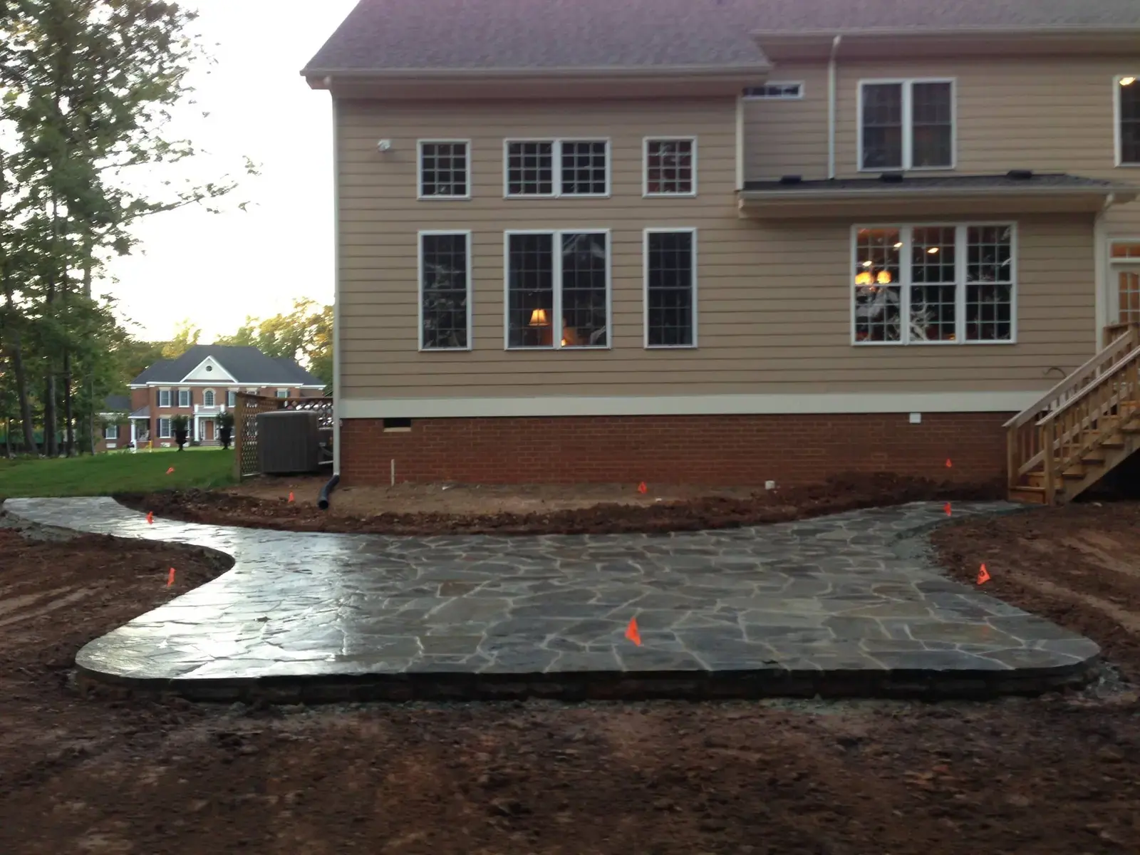 Curved patio edge outside the rear entrance