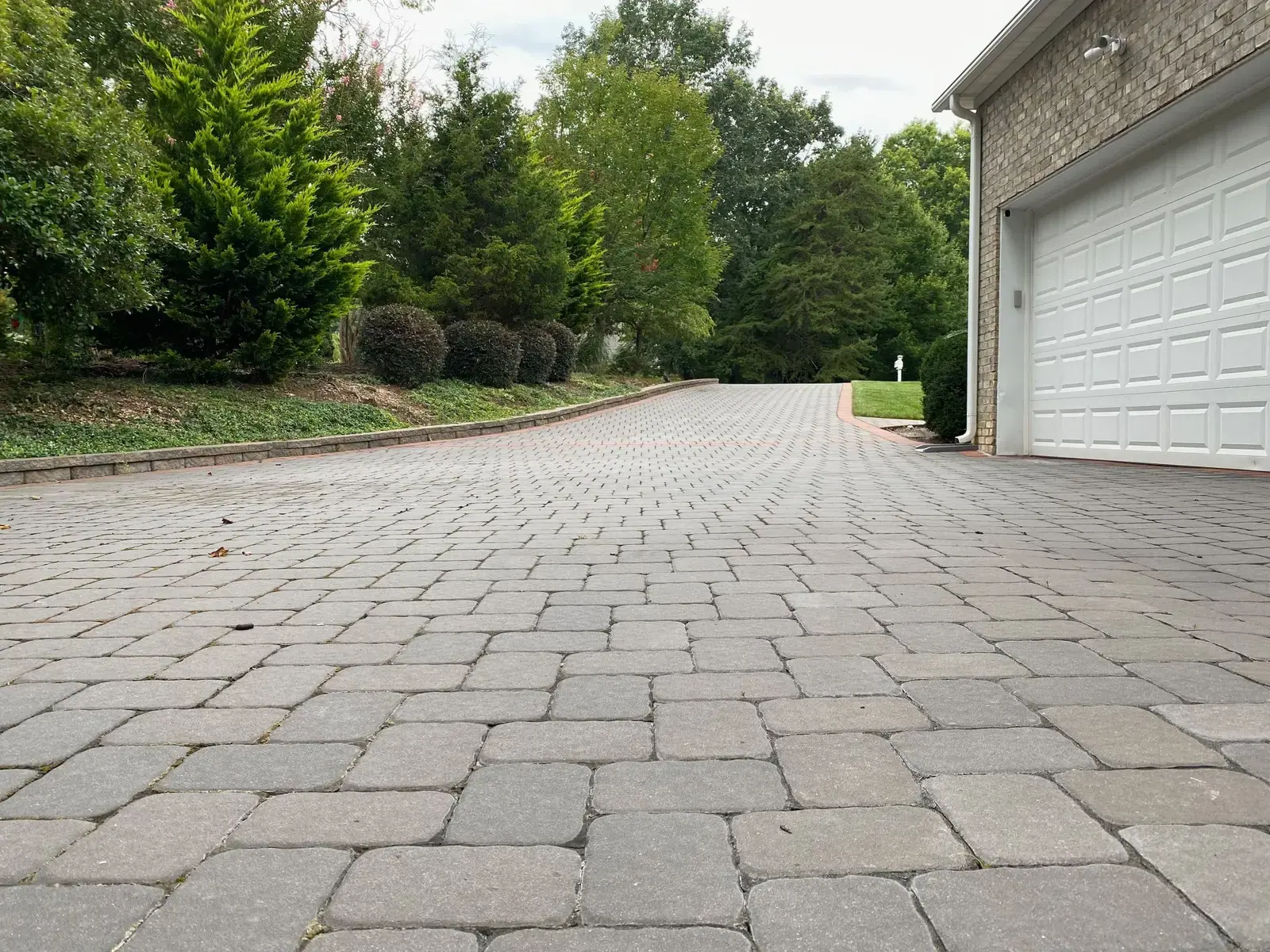 Paver surface beside the garage
