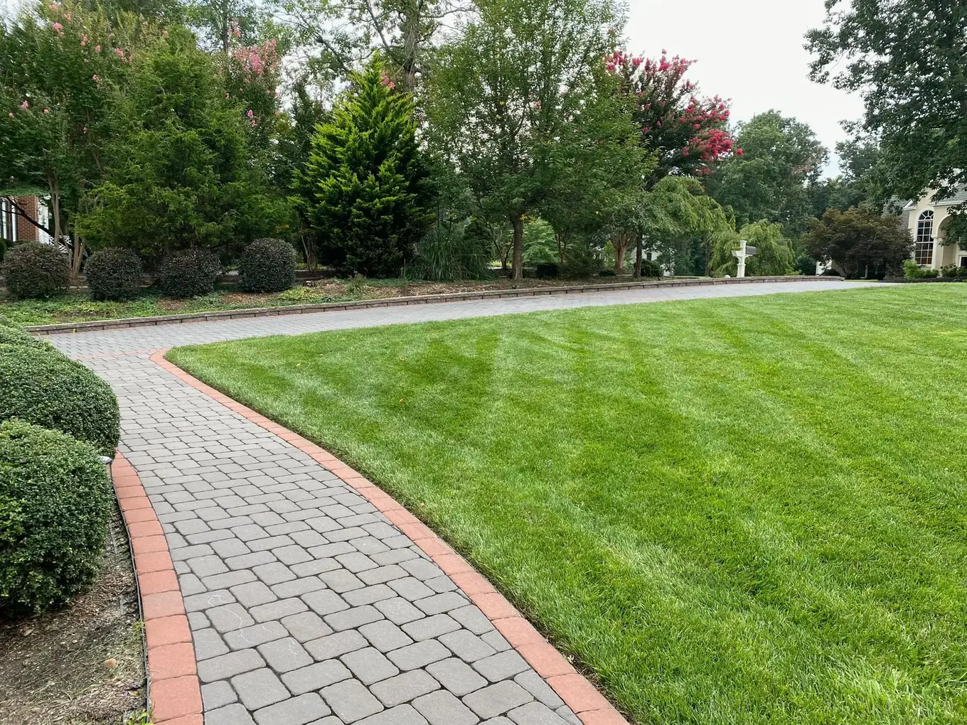 Driveway and walkway towards the home entrance