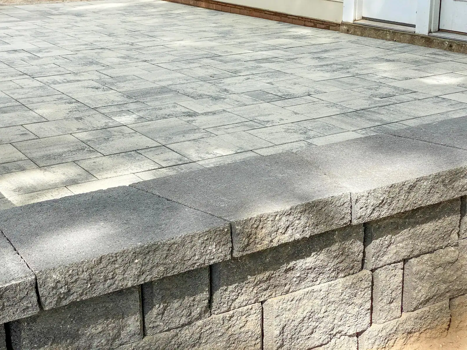 Detail of the paver edge and textured block wall