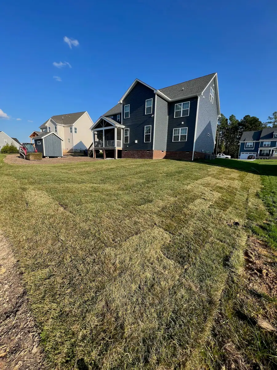 Finished sod installation beside the rear patio